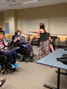 Helen leads a vocal improv session with participants in the Astonished!  Summer Literacy Program, Regina, 2019